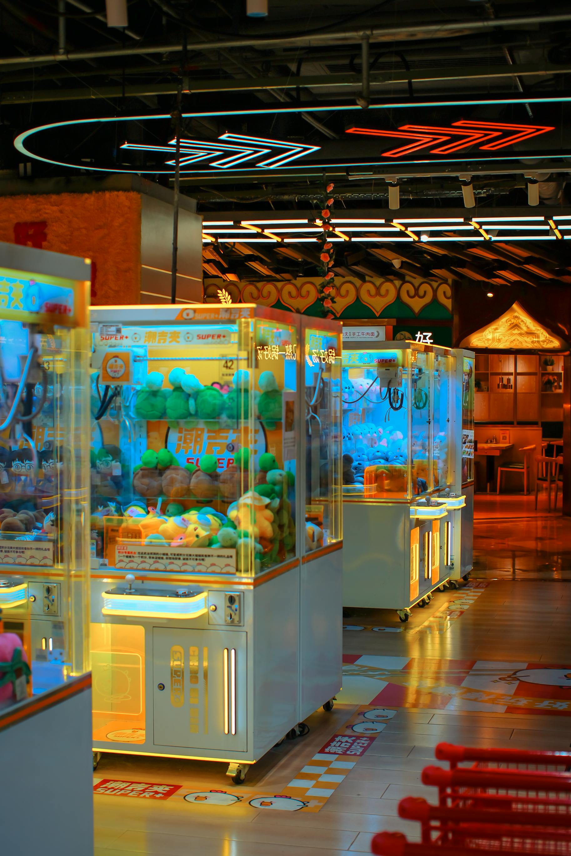 Claw machines installed in a restaurant and family entertainment center